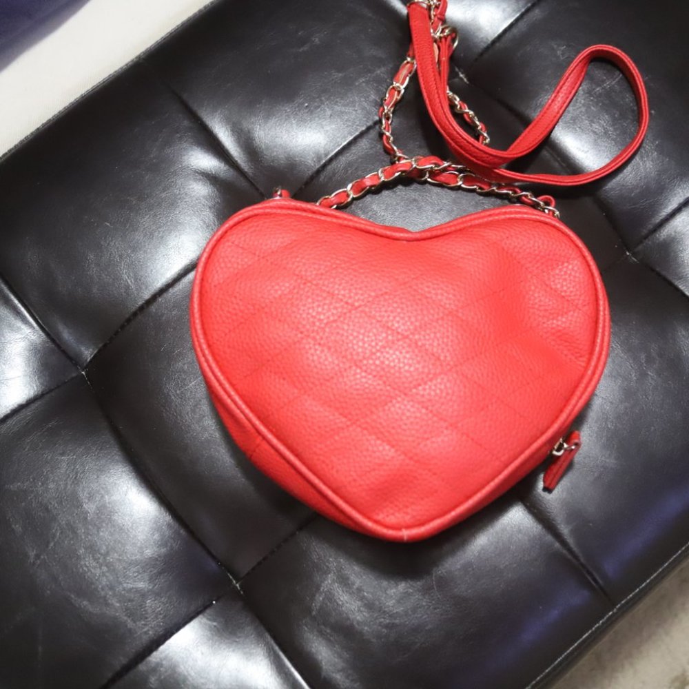 HEART SHAPED RED PURSE